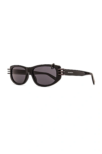 Shop Givenchy Pierced Sunglasses In Black