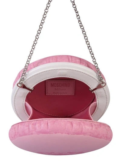 Shop Moschino Macaron Logo Print Clutch Bag In Pink