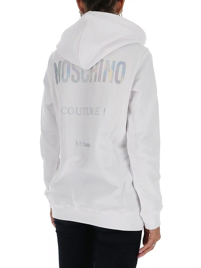 Shop Moschino Zipped Hoodie In White
