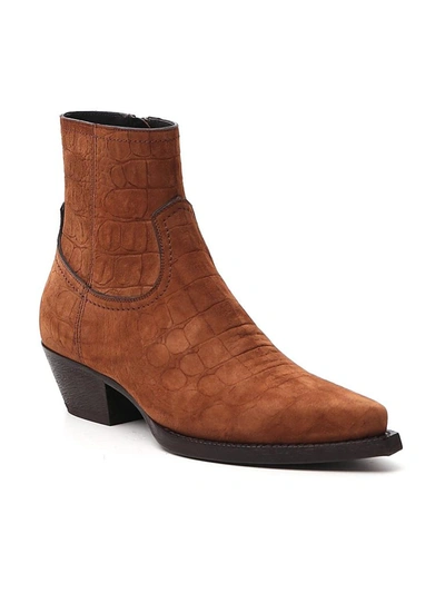 Shop Saint Laurent Lukas Western Embossed Ankle Boots In Brown