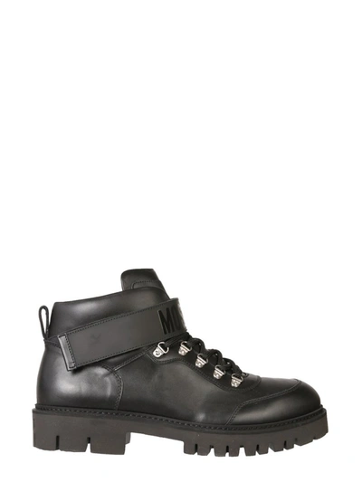Shop Moschino Lace Up Hiking Boots In Black