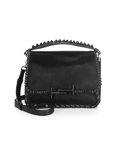 Shop Tod's Women's Studded Leather Messenger Bag In Black