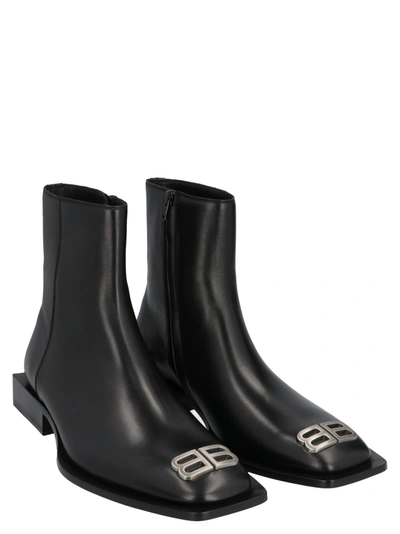 Shop Balenciaga Flat Rim Bootie Shoes In Black