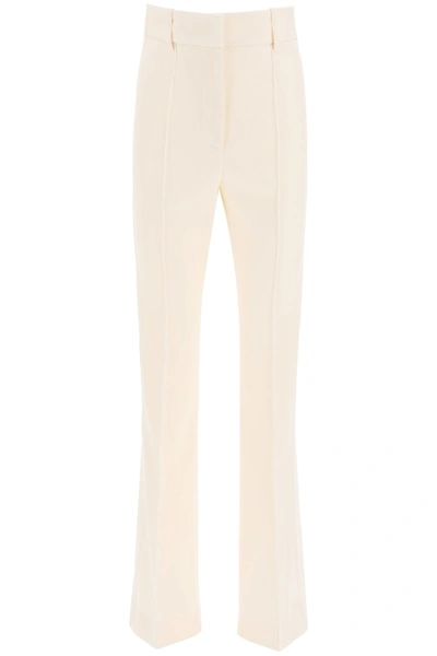 Shop Givenchy Flare Wool Pants In White (beige)