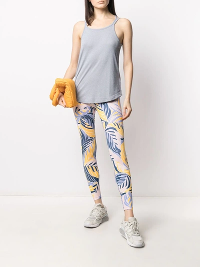 Shop Nike Leaf Print Leggings In Blue