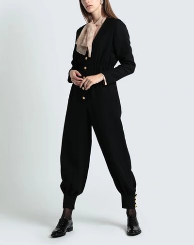 Shop Gucci Jumpsuit/one Piece In Black
