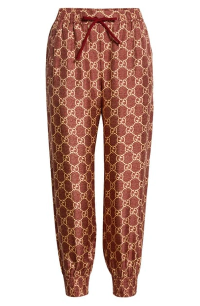 Shop Gucci Gg Supreme Print Silk Crop Joggers In Sweet Berries/ Rose B