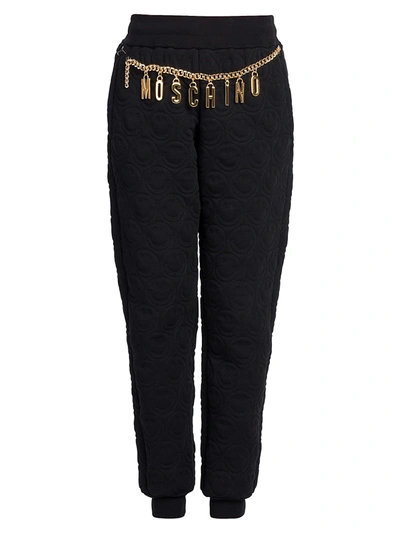 Shop Moschino Quilted Chain Trousers In Black