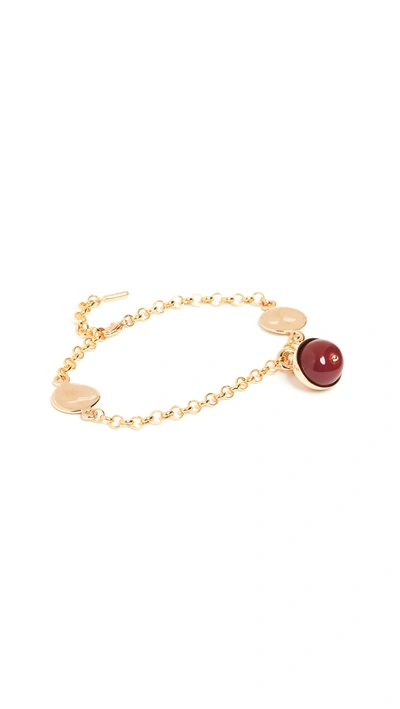 Shop Soko Kazuri Ripple Link Bracelet In Gold/berry