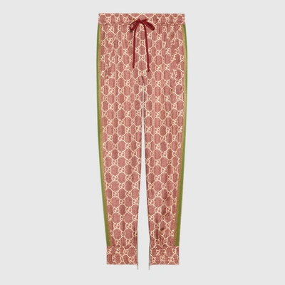 Shop Gucci Gg Supreme Print Silk Trousers In Pink