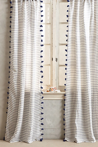 Shop Anthropologie Pom Tassel Curtain By  In Blue Size 50" X 96"