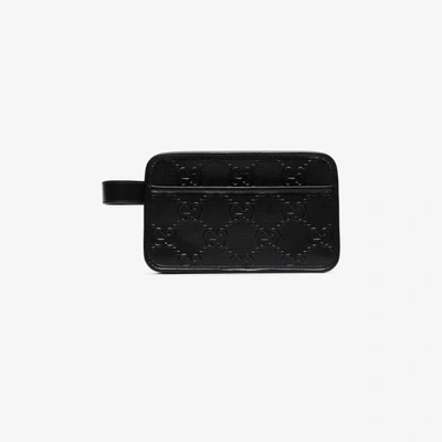 Shop Gucci Black Gg Embossed Leather Washbag