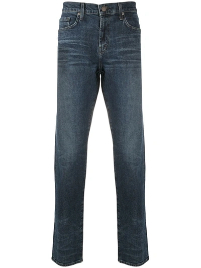 Shop J Brand Tyler Taper Tapered Jeans In Blue