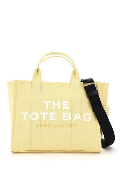 Shop Marc Jacobs The Small Traveler Tote Bag In Cream (yellow)