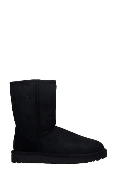 Shop Ugg Classi Short Ii Low Heels Ankle Boots In Black Suede