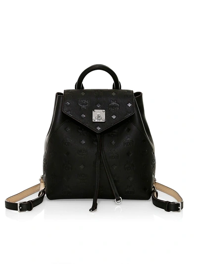 Shop Mcm Women's Essential Monogram Leather Backpack In Black