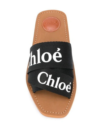 Shop Chloé Woody Logo Slides In Black