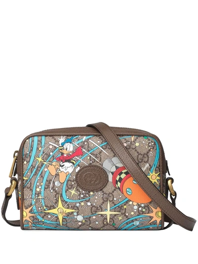 Shop Gucci X Disney Gg Supreme Canvas Shoulder Bag In Neutrals