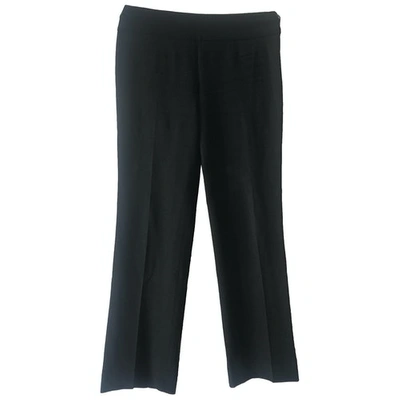 Pre-owned Moschino Wool Straight Pants In Black