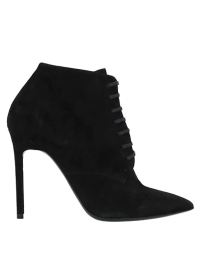 Shop Saint Laurent Ankle Boots In Black