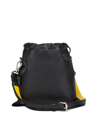 Shop Fendi Logo Drawstring Shoulder Bag In Black