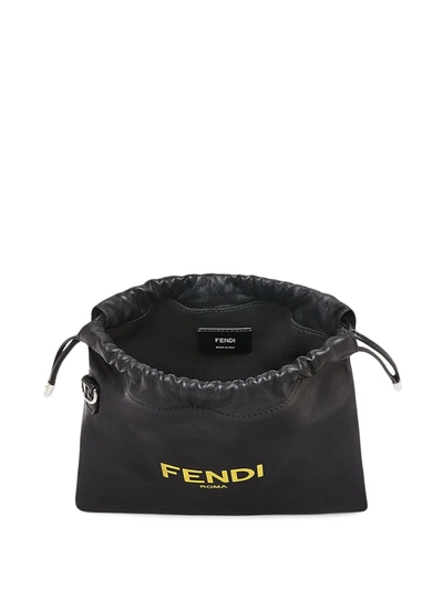 Shop Fendi Logo Drawstring Shoulder Bag In Black