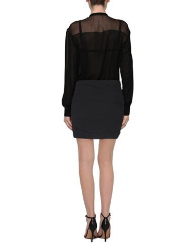 Shop Saint Laurent Mini Skirts In Black