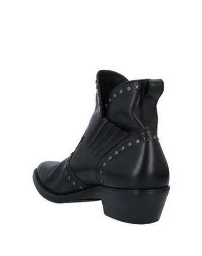 Shop Saint Laurent Ankle Boots In Black