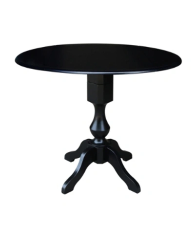 Shop International Concepts International Concept 42" Round Dual Drop Leaf Pedestal Table In Black