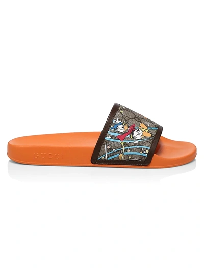 Shop Gucci Disney X  Donald Duck Pursuit Slide Sandals In Beige Ebony