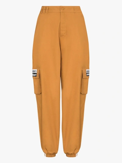 Shop Adidas Originals Embroidered Logo Pocket Track Pants In Brown