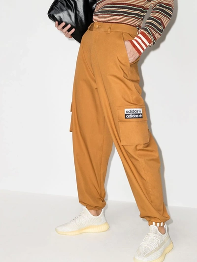Shop Adidas Originals Embroidered Logo Pocket Track Pants In Brown