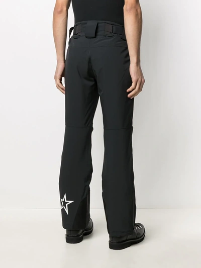 Shop Perfect Moment Star-print Buckle-fastening Trousers In Black