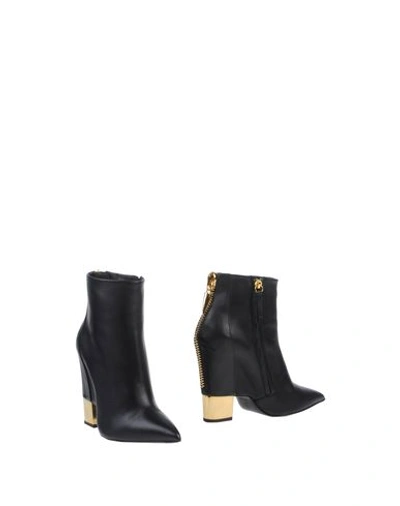 Giuseppe Zanotti Leather Cutout Wedge Ankle Boots In Nero