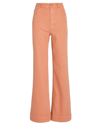 Shop Ulla Johnson Theo Flared Wide-leg Jeans In Coral
