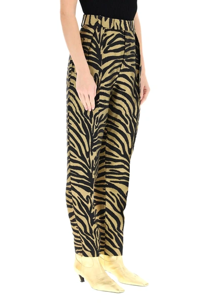 Shop Khaite Magdeline Zebra Print Trousers In Black,gold