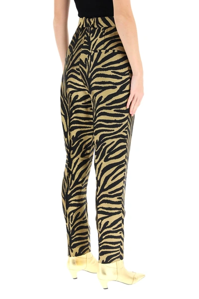 Shop Khaite Magdeline Zebra Print Trousers In Black,gold