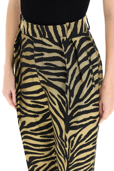 Shop Khaite Magdeline Zebra Print Trousers In Black,gold
