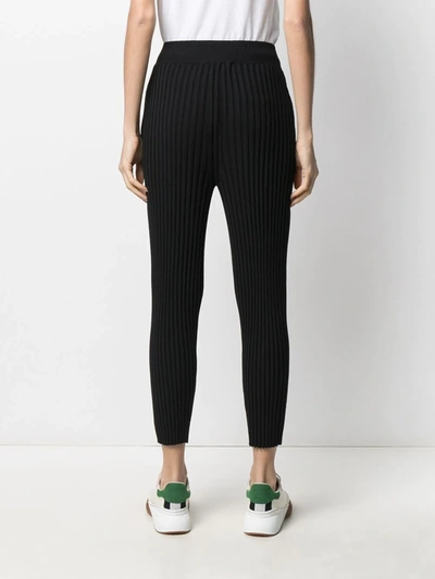 Shop Stella Mccartney Pleated Knitted Trousers In Black
