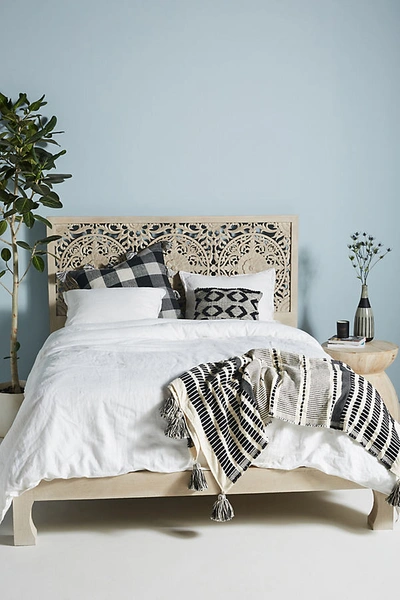 Shop Anthropologie Handcarved Low Lombok Bed By  In Beige Size Q Top/bed