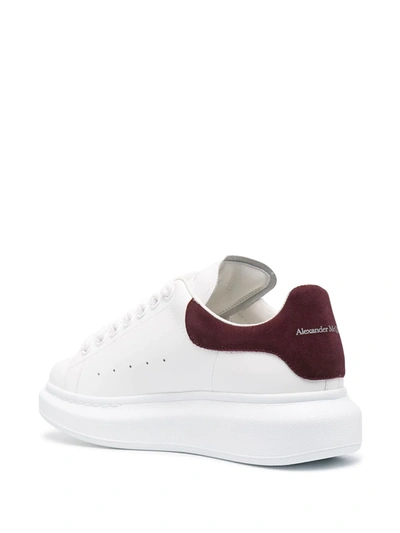 Shop Alexander Mcqueen Oversized Lace-up Sneakers In White