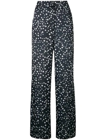 Lédition Star Print Trousers In Blue