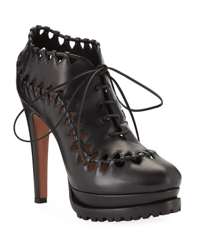 Alaïa Cutout Platform Leather Booties In Black