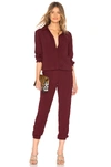 Monrow Crepe Long Sleeve Jumpsuit In Wine. In Bordeaux