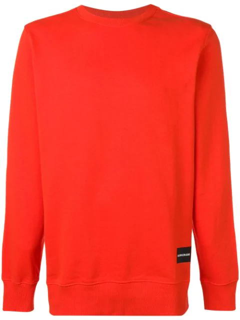 orange calvin klein sweatshirt