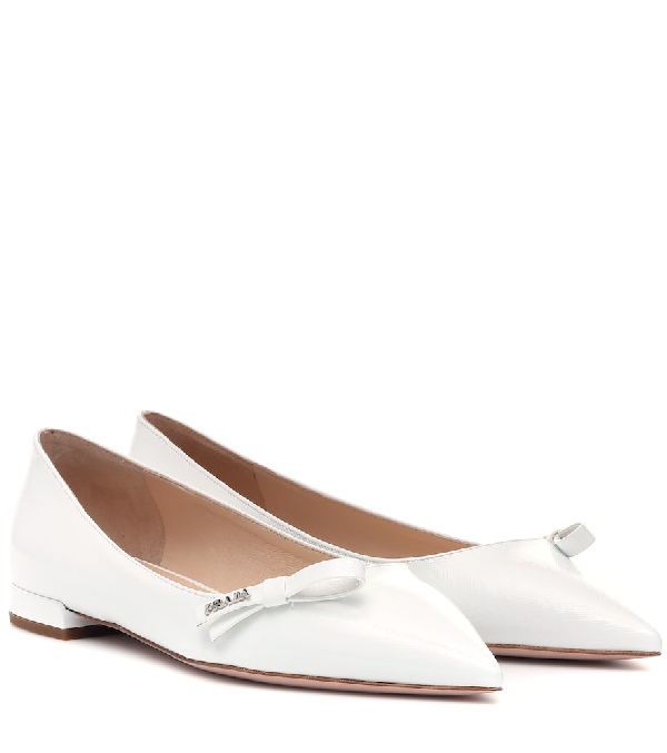 white leather ballet flats