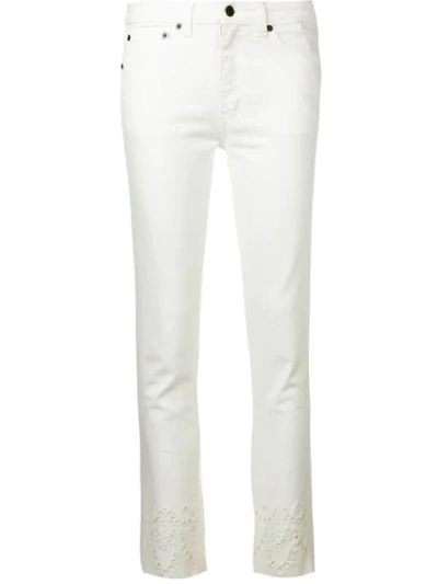 Saint Laurent Straight-fit Eyelet Embroidered-hem Jeans In White