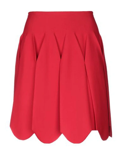 Alaïa Midi Skirts In Red