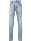 Philipp Plein Faded Distressed Slim Jeans In Blue