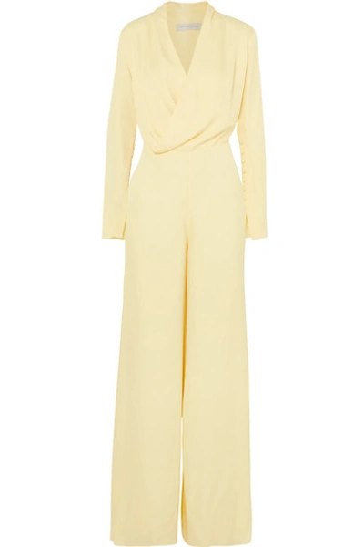 Les Hã©roã¯nes The Tina Wrap-effect Satin Jumpsuit In Pastel Yellow